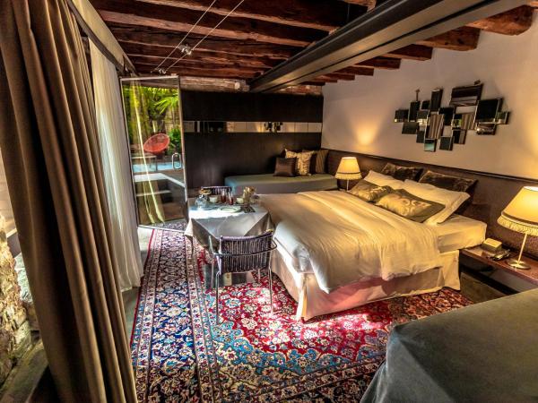 Avogaria 5 Rooms : photo 1 de la chambre suite junior confort avec jardin privé