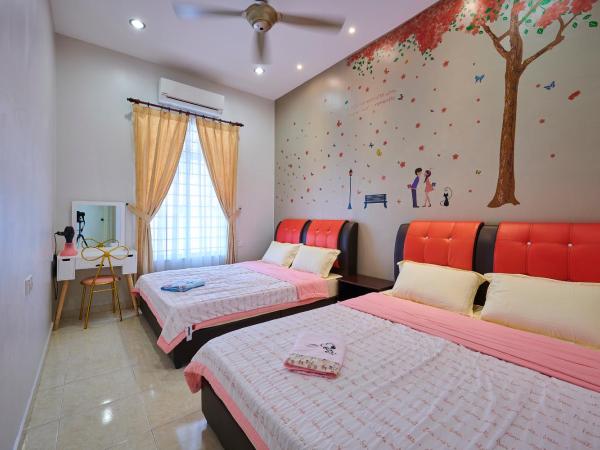 Esdi Homestay Malacca : photo 2 de la chambre chambre familiale deluxe