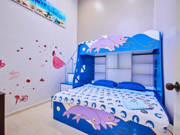 Esdi Homestay Malacca : photo 3 de la chambre chambre familiale deluxe
