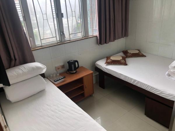 Hung Fai Guest House : photo 7 de la chambre chambre triple