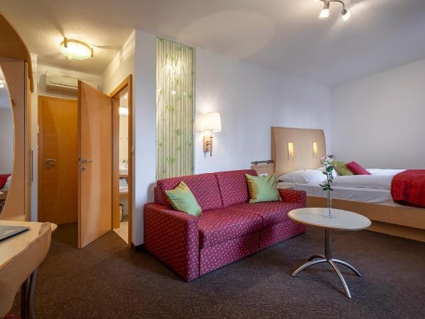 Strandhotel Alte Donau : photo 7 de la chambre chambre double supérieure - vue sur jardin