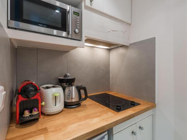 CosyCocoon : photo 2 de la chambre appartement supérieur