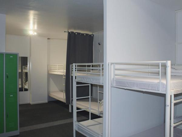 Le Coffice Auberge de Jeunesse : photo 8 de la chambre lit superposé dans dortoir mixte avec salle de bains commune