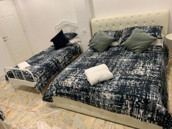 Di Palma Suite Museum : photo 7 de la chambre quadruple room with terrace and private external bathroom