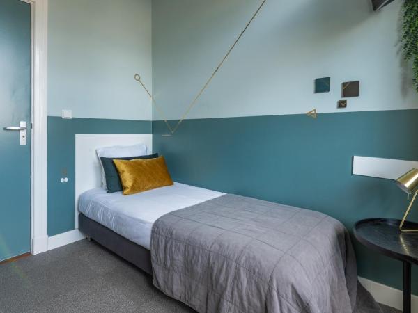 Boutique Hotel Het Scheepshuys : photo 1 de la chambre chambre simple avec salle de bains commune