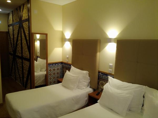 Pensao Estacao Central : photo 3 de la chambre chambre triple