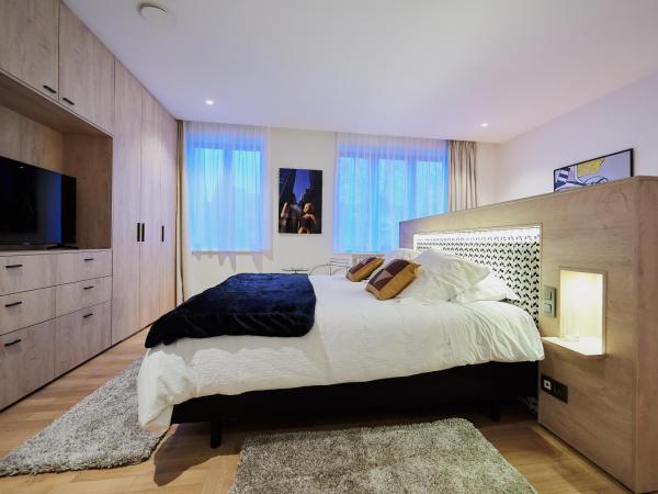 B&B Suites 124 : photo 7 de la chambre suite deluxe avec lit king-size