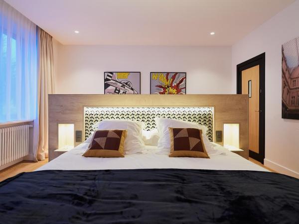 B&B Suites 124 : photo 5 de la chambre suite deluxe avec lit king-size