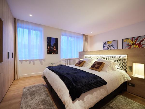 B&B Suites 124 : photo 1 de la chambre suite deluxe avec lit king-size