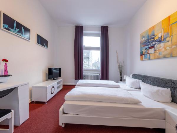 Trip Inn Hotel Schumann : photo 3 de la chambre chambre familiale