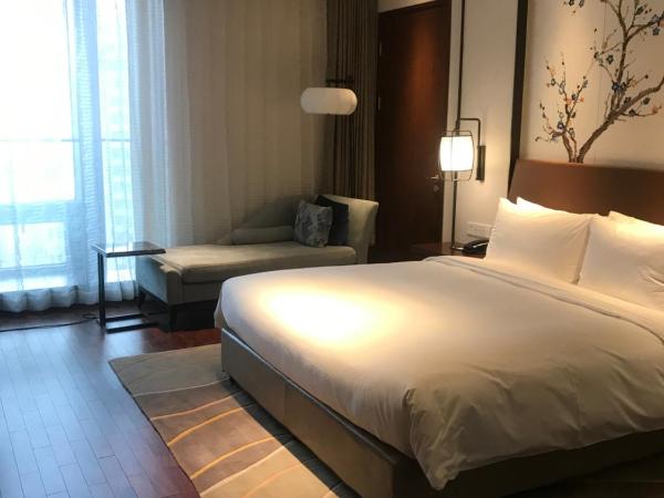 LJZ Supreme Tower Hotel : photo 4 de la chambre chambre lit queen-size deluxe