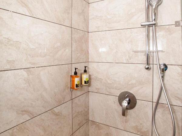 Mango Suites Viera : photo 6 de la chambre chambre deluxe double ou lits jumeaux