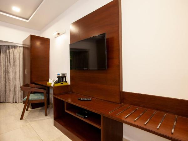 Mango Suites Viera : photo 8 de la chambre chambre deluxe double ou lits jumeaux