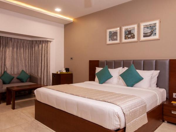 Mango Suites Viera : photo 9 de la chambre chambre double ou lits jumeaux