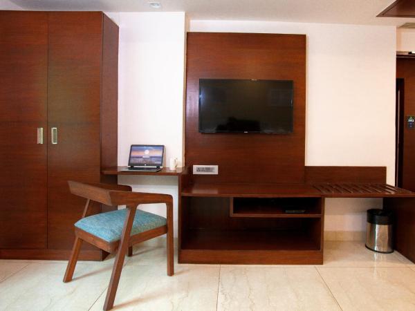 Mango Suites Viera : photo 1 de la chambre grande chambre double