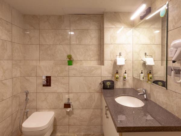 Mango Suites Viera : photo 2 de la chambre grande chambre double