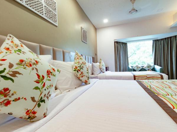 Mango Suites Viera : photo 6 de la chambre grande chambre double