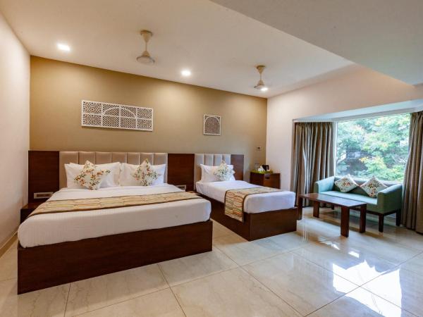 Mango Suites Viera : photo 8 de la chambre grande chambre double