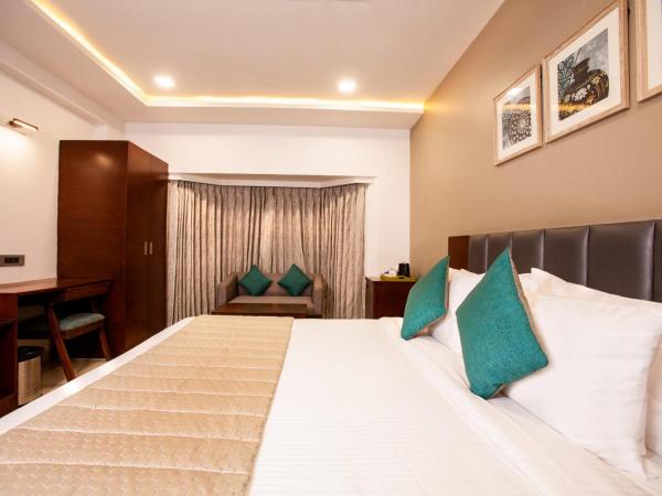 Mango Suites Viera : photo 2 de la chambre chambre double ou lits jumeaux