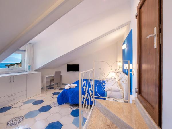 Caruso sea view : photo 1 de la chambre chambre quadruple - vue sur mer