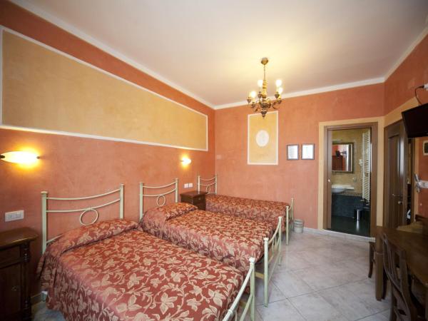 Hotel Merlini : photo 2 de la chambre chambre triple