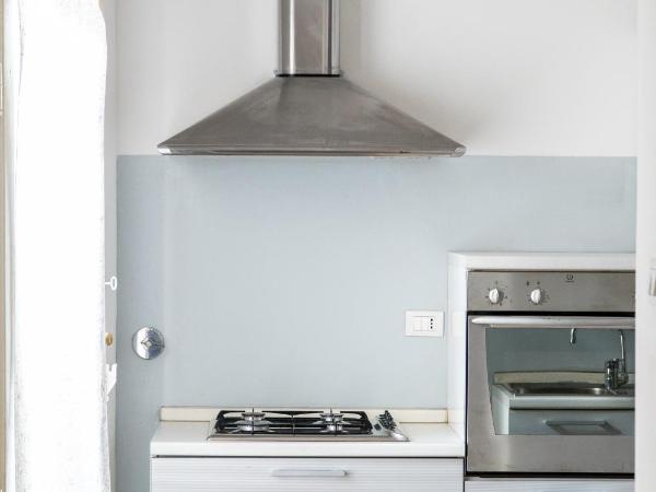 Residence Le Cure : photo 9 de la chambre appartement avec salle de bains commune et terrasse