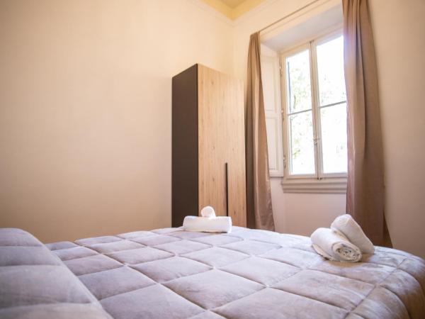 Residence Le Cure : photo 1 de la chambre chambre double avec salle de bains commune