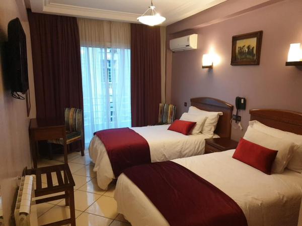 Hôtel Amouday : photo 1 de la chambre chambre lits jumeaux