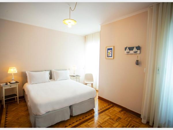 Senhor Gigi : photo 4 de la chambre chambre double ou lits jumeaux deluxe – vue sur jardin