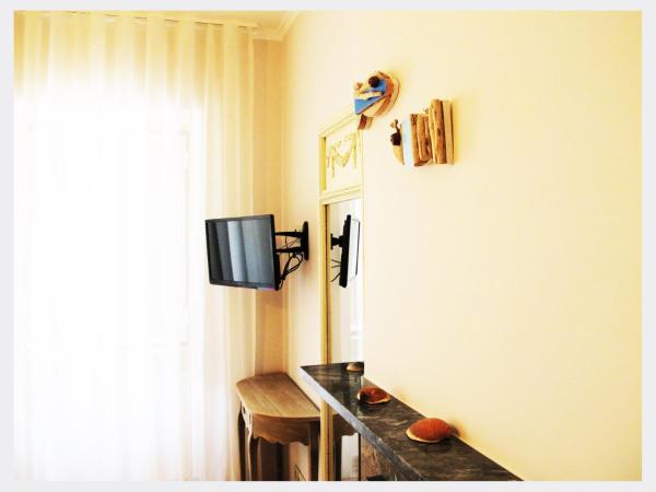 Senhor Gigi : photo 7 de la chambre chambre double ou lits jumeaux deluxe avec balcon