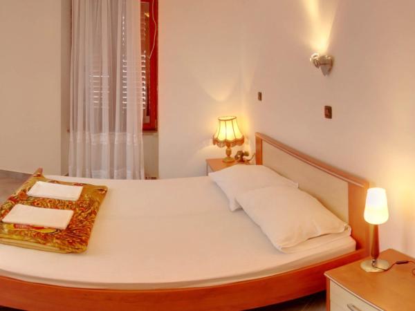 Rooms Laura : photo 4 de la chambre chambre triple