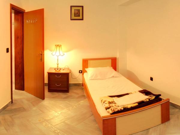 Rooms Laura : photo 3 de la chambre chambre triple