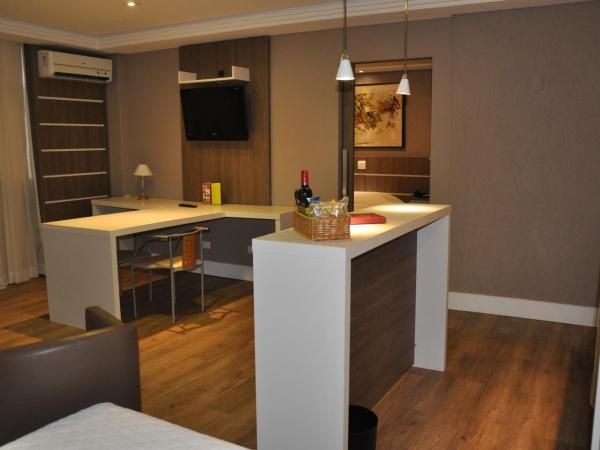 SJ Royal - San Juan Curitiba : photo 6 de la chambre chambre triple supérieure