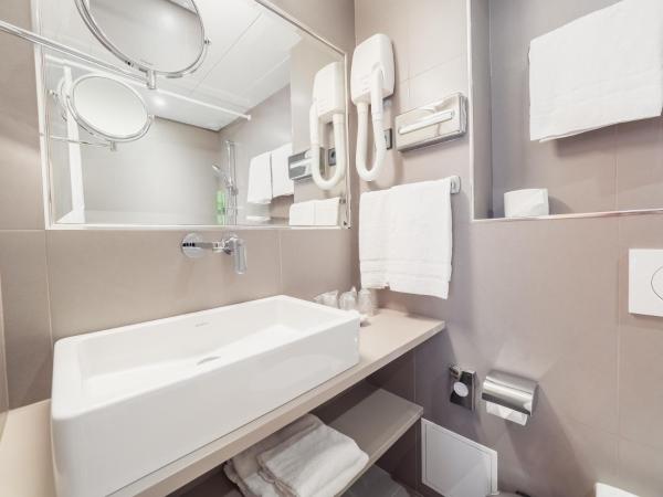 New Orient Hotel : photo 6 de la chambre chambre triple avec baignoire