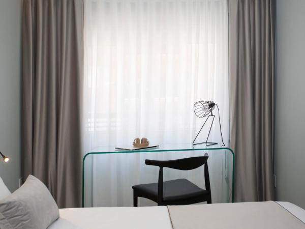 Palacios Rooms : photo 2 de la chambre chambre lits jumeaux avec salle de bains privative séparée