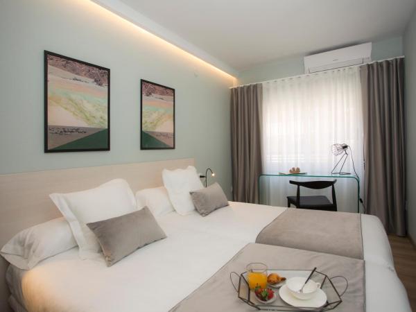 Palacios Rooms : photo 3 de la chambre chambre lits jumeaux avec salle de bains privative séparée