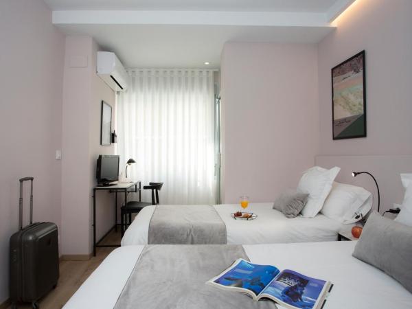 Palacios Rooms : photo 4 de la chambre chambre lits jumeaux avec salle de bains privative séparée