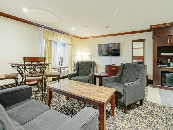 Woodbine Hotel & Suites : photo 2 de la chambre suite romantique lit king-size avec jacuzzi