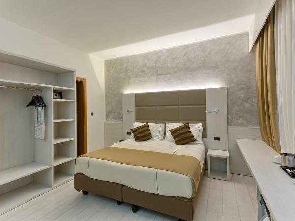 Agape Hotel AA Hotels : photo 1 de la chambre chambre double ou lits jumeaux supérieure