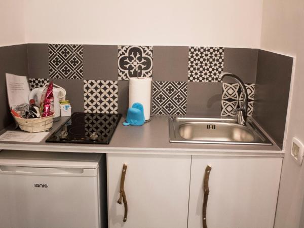 Aretusa Vacanze B&B : photo 4 de la chambre chambre quadruple