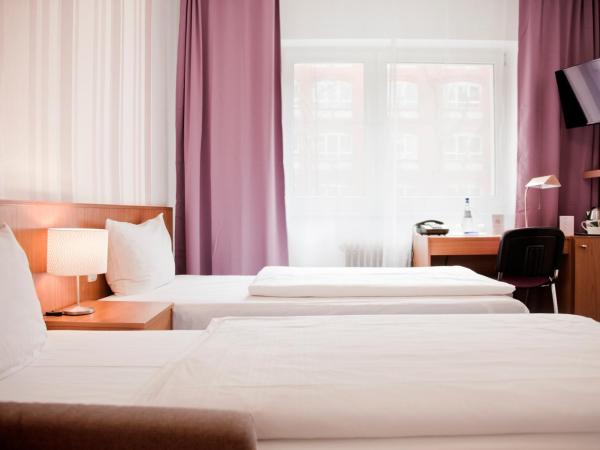 Les Nations : photo 7 de la chambre chambre double deluxe avec lit d'appoint