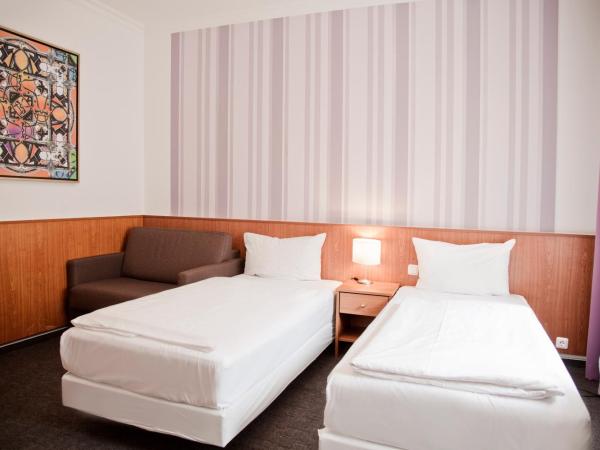 Les Nations : photo 6 de la chambre chambre double deluxe avec lit d'appoint