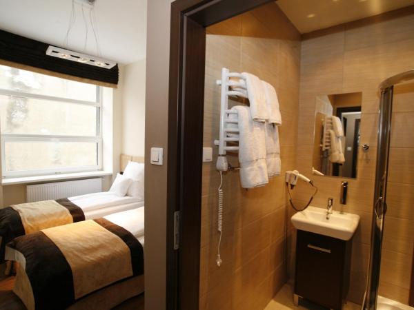 Boutique Hotel's II : photo 9 de la chambre chambre lits jumeaux