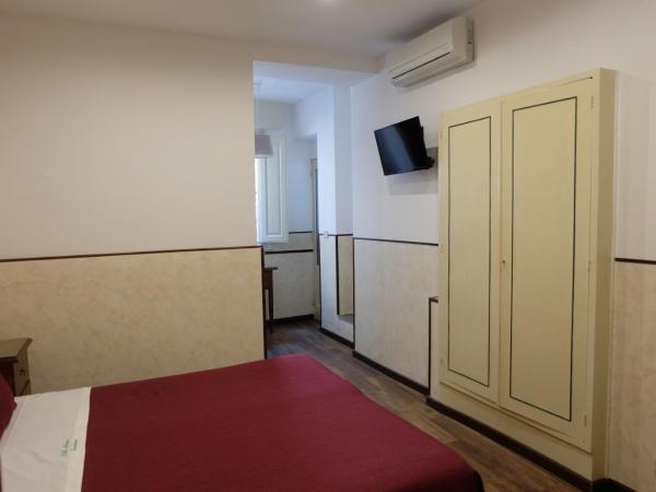 Hotel Villa Nettuno : photo 2 de la chambre chambre double ou lits jumeaux - vue sur montagnes