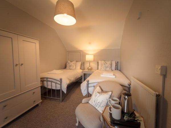 Anabelle's Guest House : photo 1 de la chambre chambre lits jumeaux avec salle de bains commune