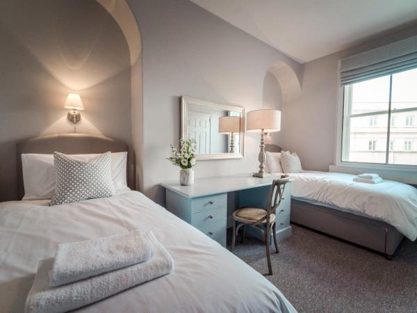 Anabelle's Guest House : photo 2 de la chambre chambre lits jumeaux avec salle de bains commune