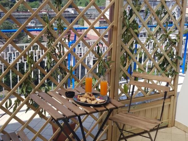 Di Palma Suite Museum : photo 1 de la chambre quadruple room with terrace and private external bathroom