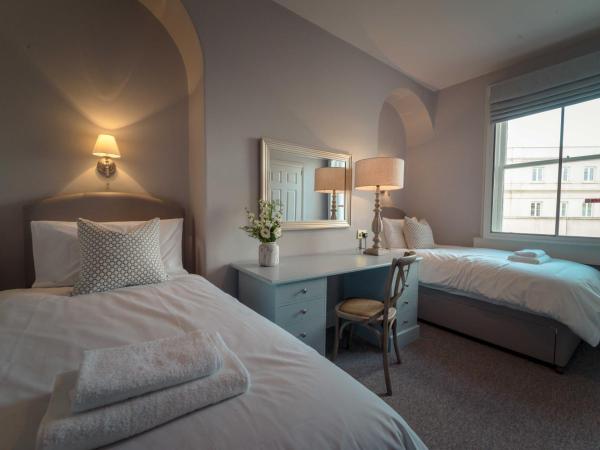 Anabelle's Guest House : photo 3 de la chambre chambre lits jumeaux avec salle de bains privative