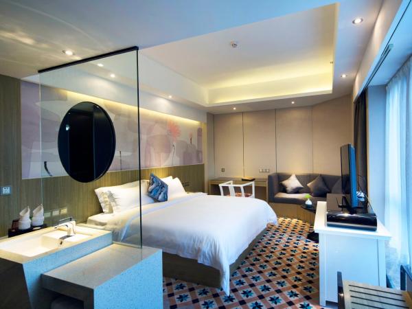 Paco Hotel Tianpingjia Metro Guangzhou - Canton Fair free shuttle bus : photo 7 de la chambre chambre supérieure lit queen-size