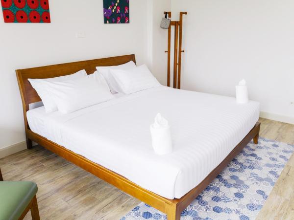 Chez Bure - Bure Homestay : photo 4 de la chambre suite deluxe avec lit king-size